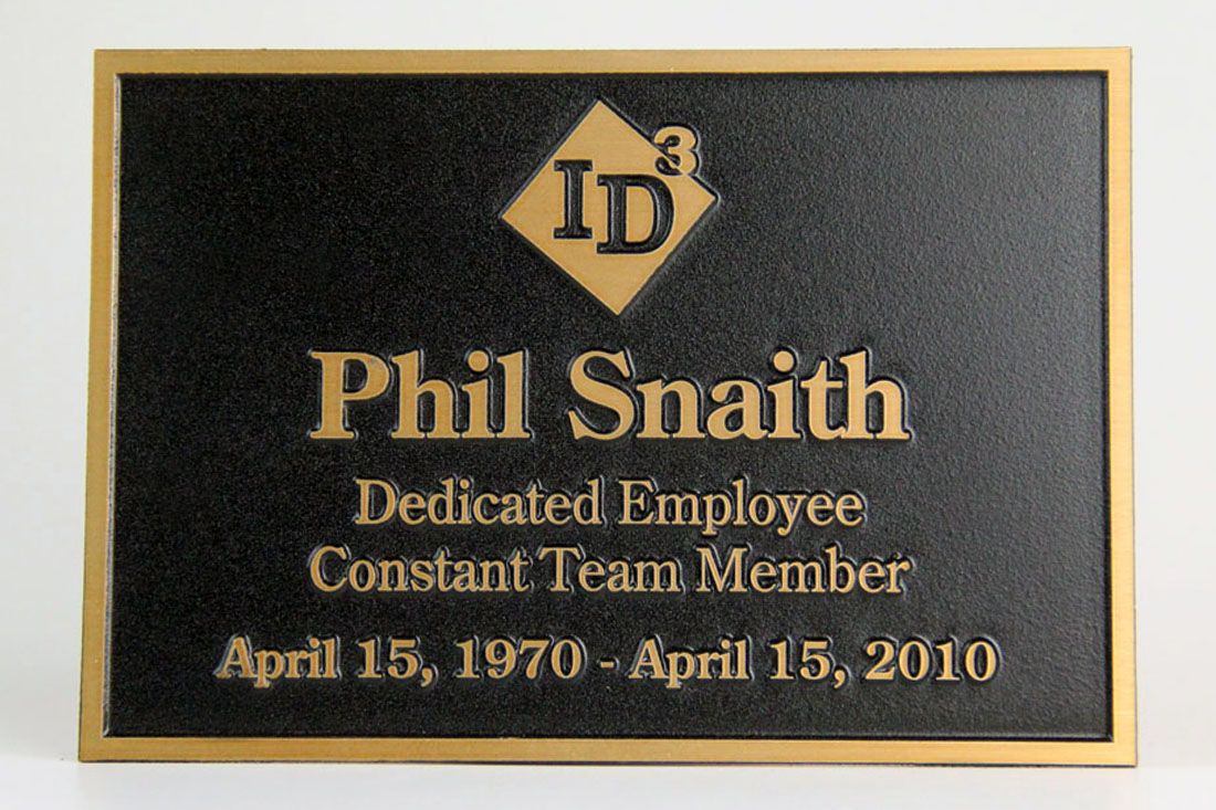 Black and gold personalized dedication plaque